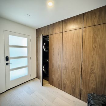 Construction Connection Services - hidden artisan closet to elevate entryway - General Contractors Near Me