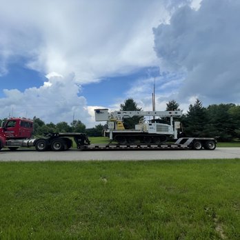 Goch & Son's Towing - Goch driver towing this machine for DTE - Towing Near Me - Detroit, Michigan Goch & Son's Towing - Goch driver towing this machine for DTE - Towing Near Me - Detroit, Michigan