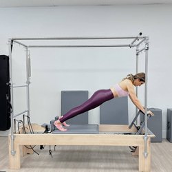 Build core strength, improve posture, and challenge your entire body with expert Cadillac Pilates training at Upgrade Pilates Laguna Hills