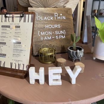 Black Phin - Table with menu - Coffee & Tea Near Me - Winter Park, Florida Black Phin - Table with menu - Coffee & Tea Near Me - Winter Park, Florida