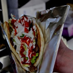 The Halal Cart - Chicken/lamb wrapped in pita bread with white/hot sauce