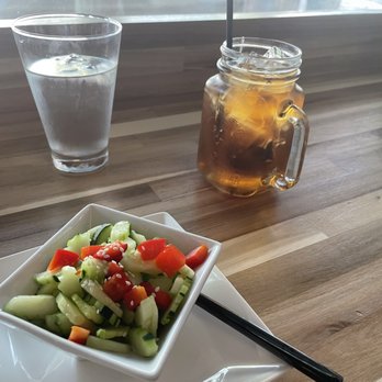 Maa Kiin - Iced tea and cucumber salad - Thai Near Me - Seattle, Washington Maa Kiin - Iced tea and cucumber salad - Thai Near Me - Seattle, Washington