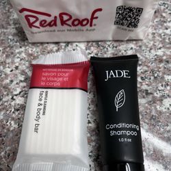 Red Roof Inn - Tiny tissue pack, bar soap and shampoo.