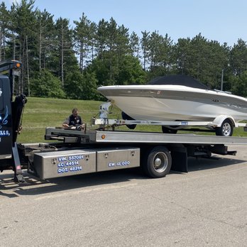 Platt's Garage - Loading boat trailer to repair - Towing Near Me - Wisconsin Dells, Wisconsin Platt's Garage - Loading boat trailer to repair - Towing Near Me - Wisconsin Dells, Wisconsin