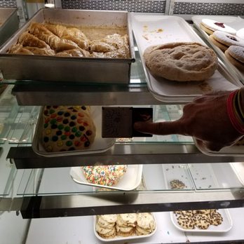 Alexis Diner - Dessert case with pack of smokes for size reference - Diners Near Me - Newburgh, New York