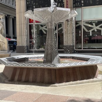 Ceres Cafe - a fountain in front of a building - American Near Me - Chicago, Illinois