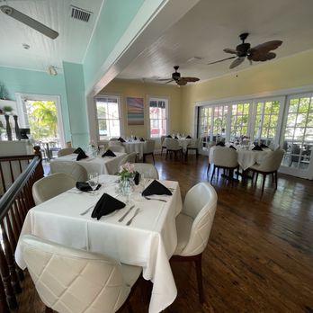 Bagatelle - Fine dining experience with indoor tables and an outdoor wrap around balcony with tables - Seafood Near Me - Key West, Florida Bagatelle - Fine dining experience with indoor tables and an outdoor wrap around balcony with tables - Seafood Near Me - Key West, Florida