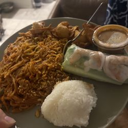 Take away Pad Thai with chicken, fresh roll, sticky rice, and crab rangoons. Delicious!!