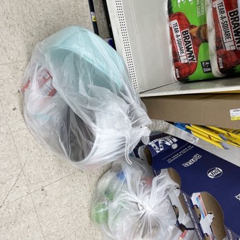 Dollar General - a bag of garbage on the floor - Discount Store Near Me - Bowie, Maryland