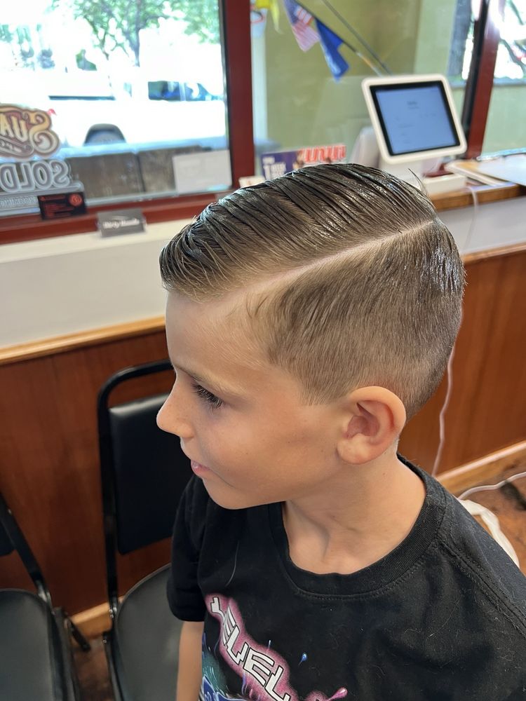 Barbershop On Main Logo