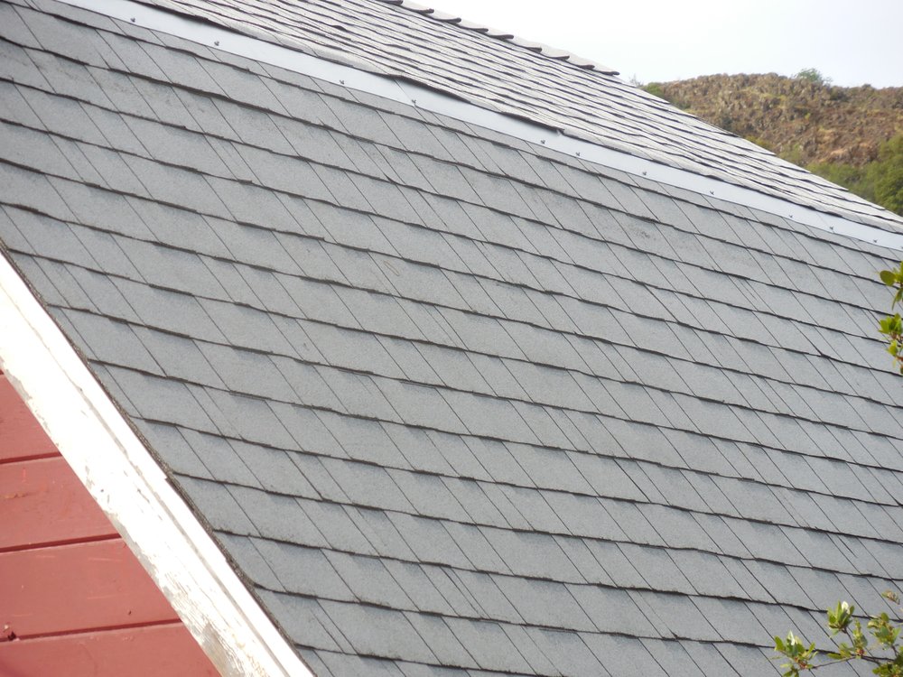 Slide of Rau Roofing