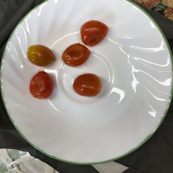 The Oven - Mushy frozen tomatoes that were sent out on my salad. - Pizza Near Me - Caro, Michigan