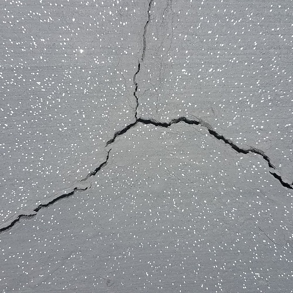 Sandman Paving and Seal Coating - Right in the center of the driveway... - Masonry/Concrete Near Me - Gilberts, Illinois Sandman Paving and Seal Coating - Right in the center of the driveway... - Masonry/Concrete Near Me - Gilberts, Illinois