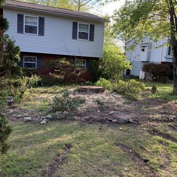 GHR Construction - a house in the background - General Contractors Near Me