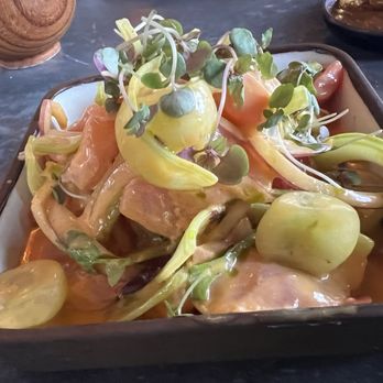 Sushi Bichi - Salmón ceviche. $10 happy hour menu with a ton of salmon. Plus shaved celery, green grapes (unusual but yummy!) and tomatoes. Delicious! - Sushi Bars Near Me - Miami Beach, Florida