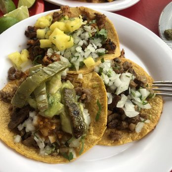Tacos Rigo - Al pastor nachos and asada tacos - Mexican Near Me - Cancún, ROO Tacos Rigo - Al pastor nachos and asada tacos - Mexican Near Me - Cancún, ROO