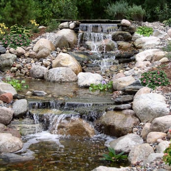 Pace Landscape & Design - a waterfall in a garden - Landscaping Near Me - Inver Grove Heights, Minnesota Pace Landscape & Design - a waterfall in a garden - Landscaping Near Me - Inver Grove Heights, Minnesota