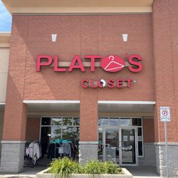 Plato's Closet - Exterior photo of Plato's Closet Markham. Red sign with glass doors beneath.
