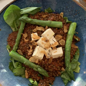 TRIS - Lentil dish with asparagus and purple sweet potatoes on a bed of spinach - New American Near Me - The Woodlands, Texas TRIS - Lentil dish with asparagus and purple sweet potatoes on a bed of spinach - New American Near Me - The Woodlands, Texas