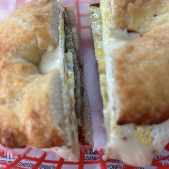 Beach Bum Bagel Cafe - Sausage egg and cheese on an Asiago - Breakfast & Brunch Near Me - Vero Beach, Florida Beach Bum Bagel Cafe - Sausage egg and cheese on an Asiago - Breakfast & Brunch Near Me - Vero Beach, Florida