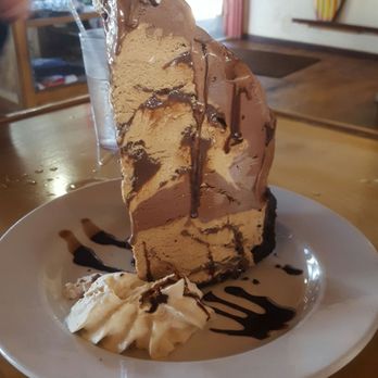 Olympic Cafe - When you order the hula pie, you have to know that one $11 slice comes this big. It's not a joke, people. - Seafood Near Me - Kapaa, Hawaii Olympic Cafe - When you order the hula pie, you have to know that one $11 slice comes this big. It's not a joke, people. - Seafood Near Me - Kapaa, Hawaii