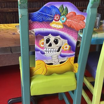 Vaqueros Grill & Cantina - One of the many deco chairs - Mexican Near Me - Jerome, Arizona Vaqueros Grill & Cantina - One of the many deco chairs - Mexican Near Me - Jerome, Arizona