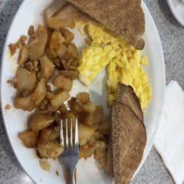 Two Eggs with Home Fries (well done), wheat toast (no butter) Two Eggs with Home Fries (well done), wheat toast (no butter)