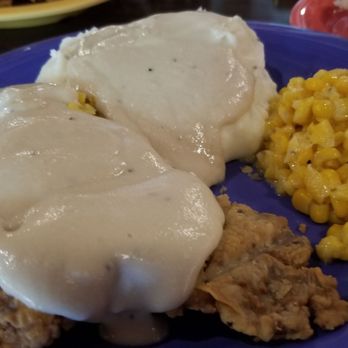 Babe's Chicken Dinner House - This is half of a chicken fried steak, with mashed potatoes, gravy, and creamed corn. The whole steak takes up too much space on the plate. - Chicken Shop Near Me - Roanoke, Texas