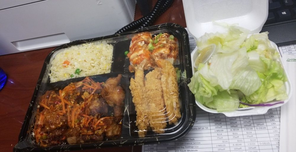 HUGE Bento box with spicy chicken. Amazing! I got about 4 meals out of