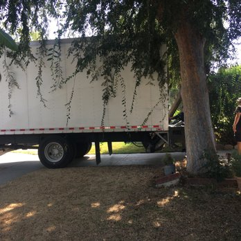 Titan Relocation Services - The driver somehow managed to back into our driveway despite the narrow residential street. - Movers Near Me - Whittier, California