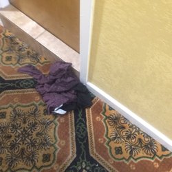 European Hostel - Random dirty clothes. There for 3days now. How can she vacuum but not see them? I ll let you Solve the mystery.