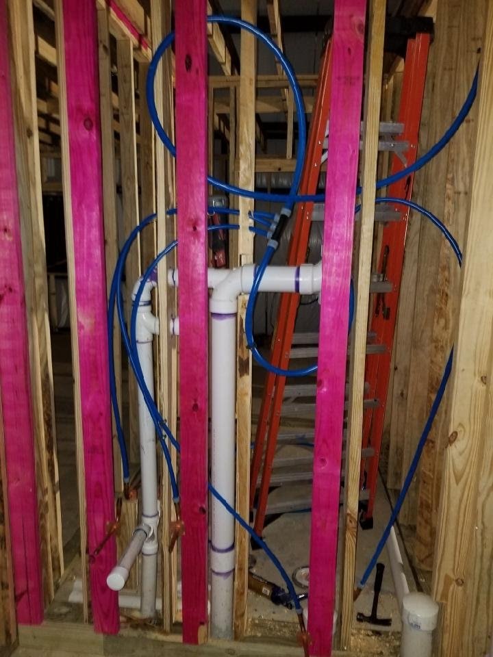 Slide of ER Tankless Water Heaters and Plumbing