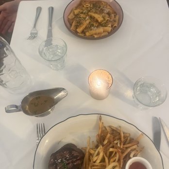 Justine - Top: Spaghetti Bolegnaise Bottom: Filet Steak Frites - French Near Me - New Orleans, Louisiana Justine - Top: Spaghetti Bolegnaise Bottom: Filet Steak Frites - French Near Me - New Orleans, Louisiana