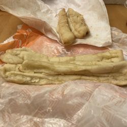 Little Caesars Pizza - Under cooked, smashed and greasy.