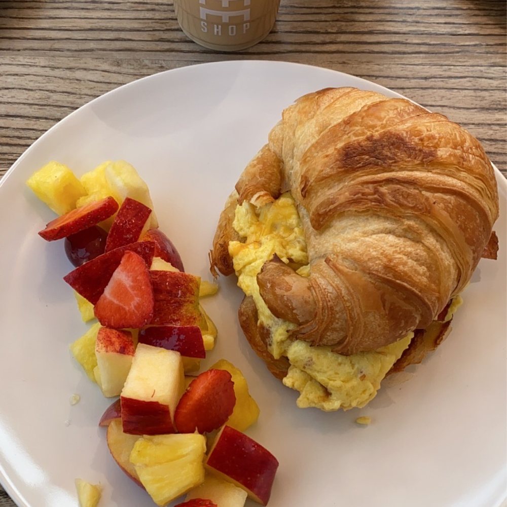 Le Coffee Shop - Vanilla ice latte with a cheddar and bacon egg croissant and a side of fruit sooooo good - Breakfast & Brunch Near Me - Temecula, California Le Coffee Shop - Vanilla ice latte with a cheddar and bacon egg croissant and a side of fruit sooooo good - Breakfast & Brunch Near Me - Temecula, California