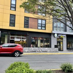 Lost Dog Cafe - Dunn Loring - Outside / Exterior pic - decent sized outdoor patio dining, free public parking garage walking distance, across from Meat Project KBBQ