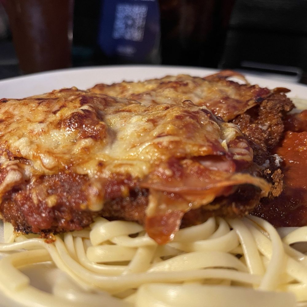 UnCork'd Kitchen & Bar  - Chicken wrapped in prosciutto with cheese on pasta - Cocktail Bars Near Me - Tucson, Arizona