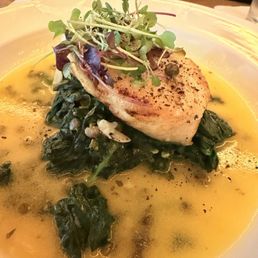 Chilean sea bass over sautéed spinach Chilean sea bass over sautéed spinach