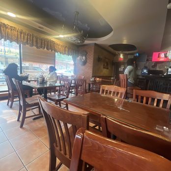 Quisqueya Restaurant - Indoor seating - Dominican Near Me - Corona, New York Quisqueya Restaurant - Indoor seating - Dominican Near Me - Corona, New York