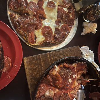Pequod's Pizza - (Bottom) : Small deep dish with pepperoni, sausage, and onion (Top): thin crust with pepperoni and jalapenos - Pizza Near Me - Chicago, Illinois Pequod's Pizza - (Bottom) : Small deep dish with pepperoni, sausage, and onion (Top): thin crust with pepperoni and jalapenos - Pizza Near Me - Chicago, Illinois