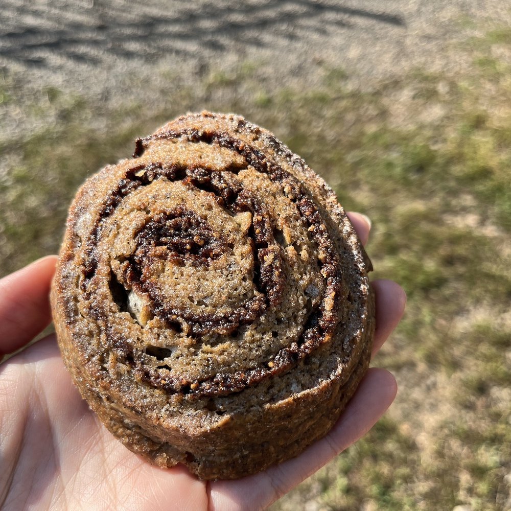 Bakeshop - a hand holding a chocolate swirl - Bakeries Near Me - Portland, Oregon