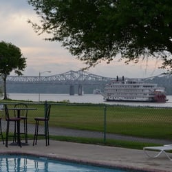 River View RV Park and Resort - Paddle Boat going by RV Park with pool in back ground