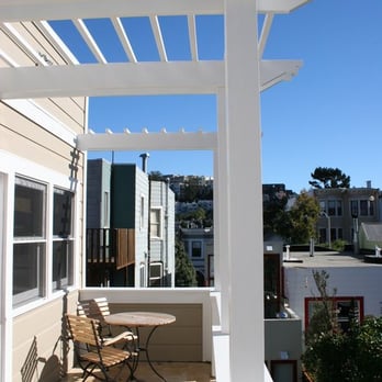 Hetherington Building - a patio with a table and chairs - General Contractors Near Me - San Anselmo, California Hetherington Building - a patio with a table and chairs - General Contractors Near Me - San Anselmo, California