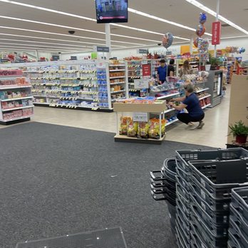 Walgreens - a man sitting on a shopping cart in a grocery store - Drugstores Near Me - Miami, Florida Walgreens - a man sitting on a shopping cart in a grocery store - Drugstores Near Me - Miami, Florida