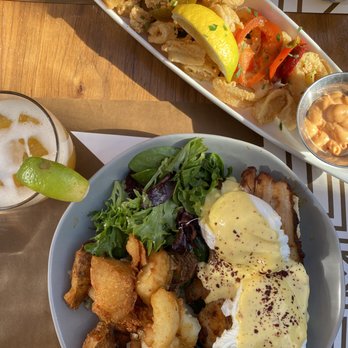 Pera Soho - smoked pork belly biscuit benedict + apricot marg + portuguese fried calamari - Mediterranean Near Me - New York, New York Pera Soho - smoked pork belly biscuit benedict + apricot marg + portuguese fried calamari - Mediterranean Near Me - New York, New York
