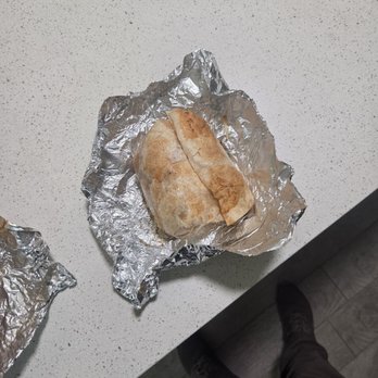 Chipotle Mexican Grill - Actual photo of the half burrito freshly unwrapped - Mexican Near Me - Fort Worth, Texas