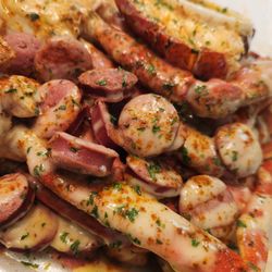 Garlic crab legs & Veggies plate, plus lobster