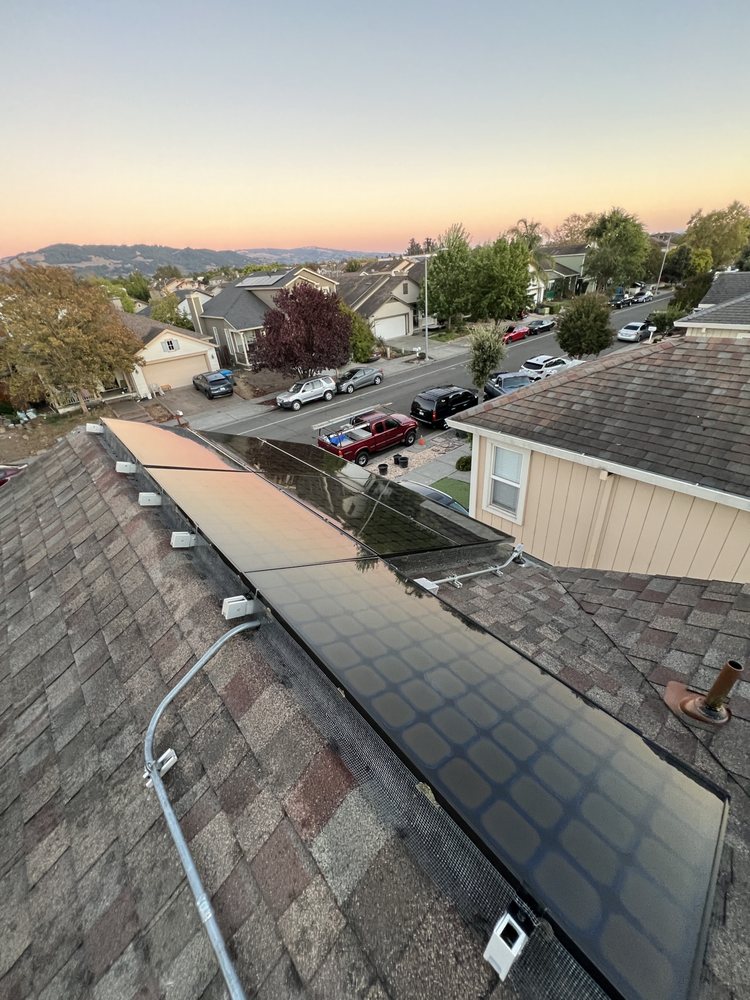 Slide of E Sanchez roofing