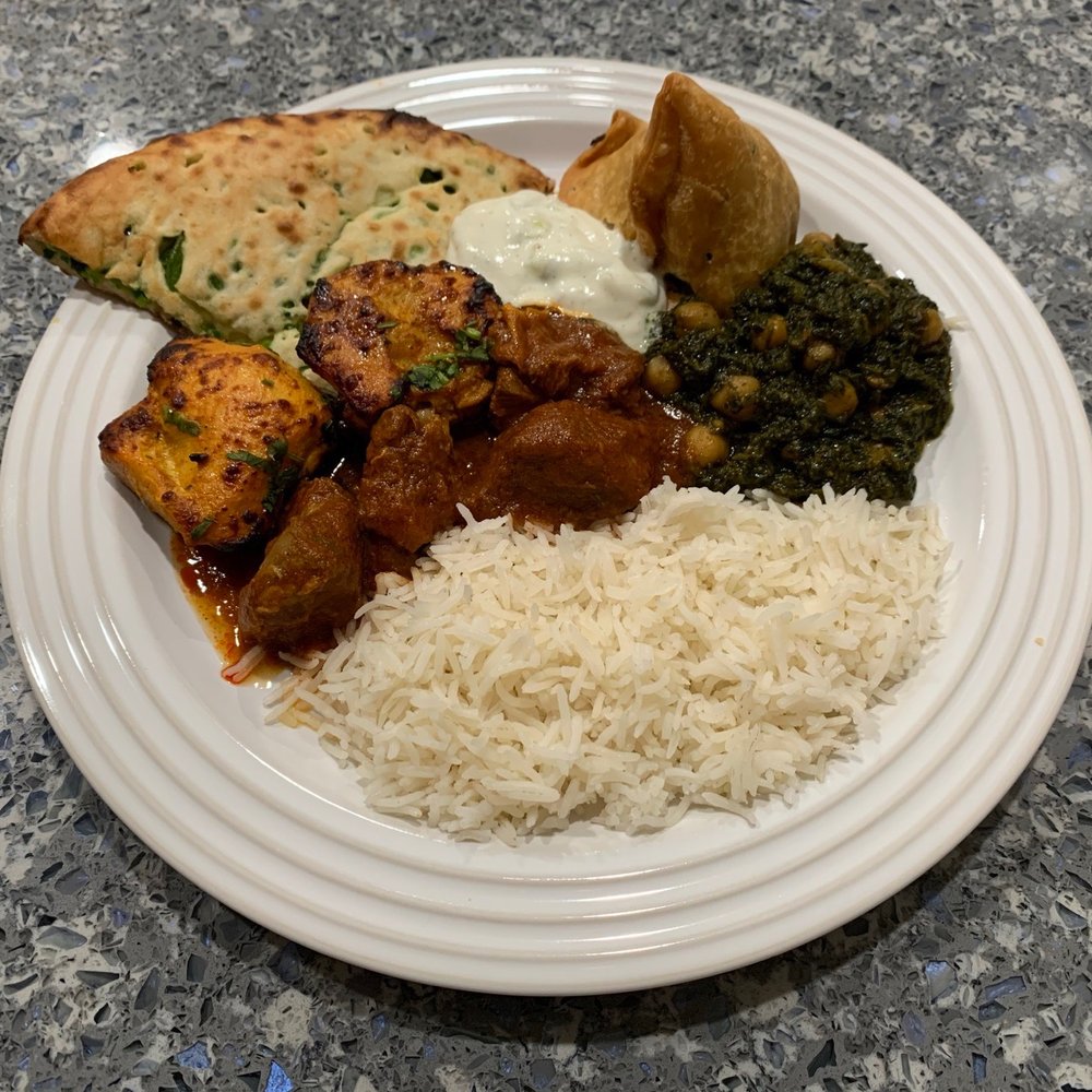 Tandoori Place - Jalapeno Naan, Tandoori Chicken Tikka, Vegetable Samosa, Lamb Rogan Josh Curry, Channa Saag (Vegan), and Cucumber Raita. - Indian Near Me - Bronx, New York