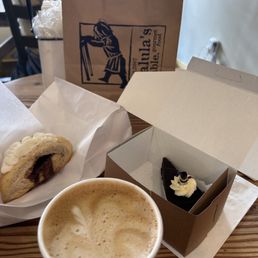 Cinnamon bun scone, flourless chocolate cake, chagalatte